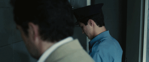 Gomez runs into Chavez at the precinct bathroom Chavez and Gomez in the bathroom